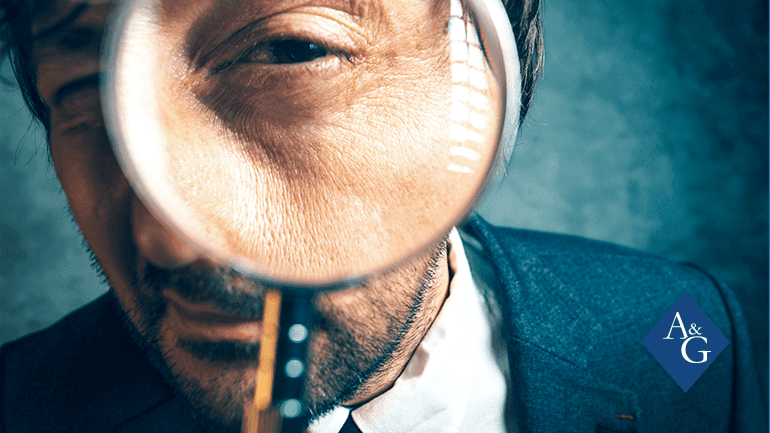 Man using a magnifying glass