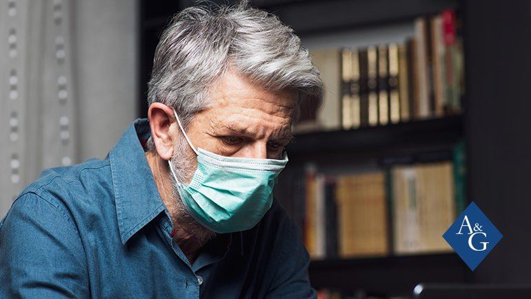 Older man wearing a mask