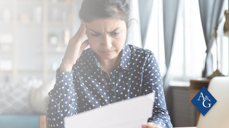 Woman looking at a piece of paper